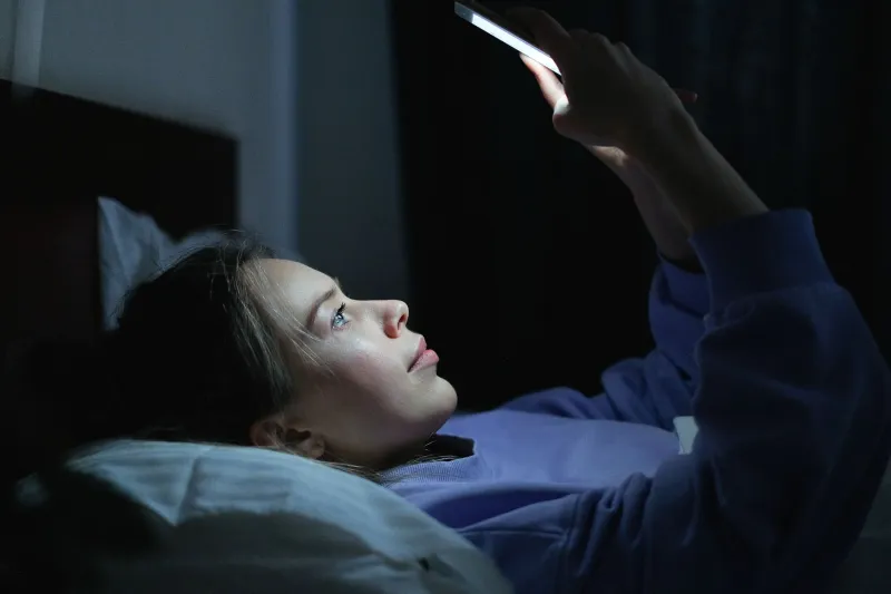 Why You Can't Stop Scrolling Before Bed (It's Not Laziness — Your Brain Is Trying to Cope)